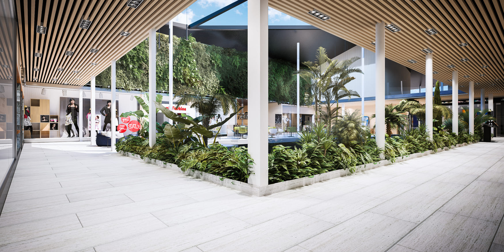 Patio interior peatonal con pérgolas de listones de madera, jardineras y lucernarios sobre tiendas