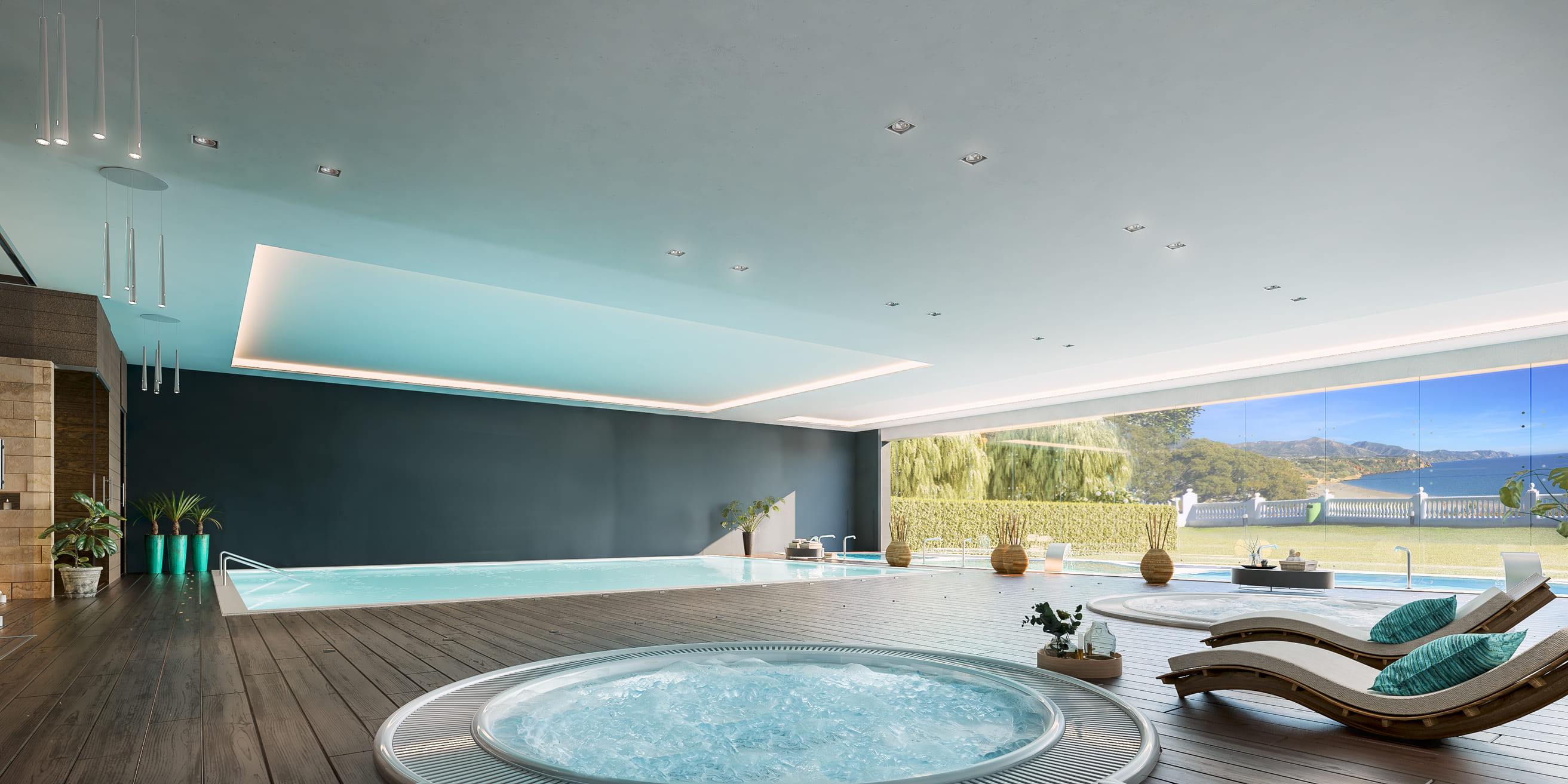 Piscina interior climatizada del Parador de Nerja con tumbonas y ventanales al jardín