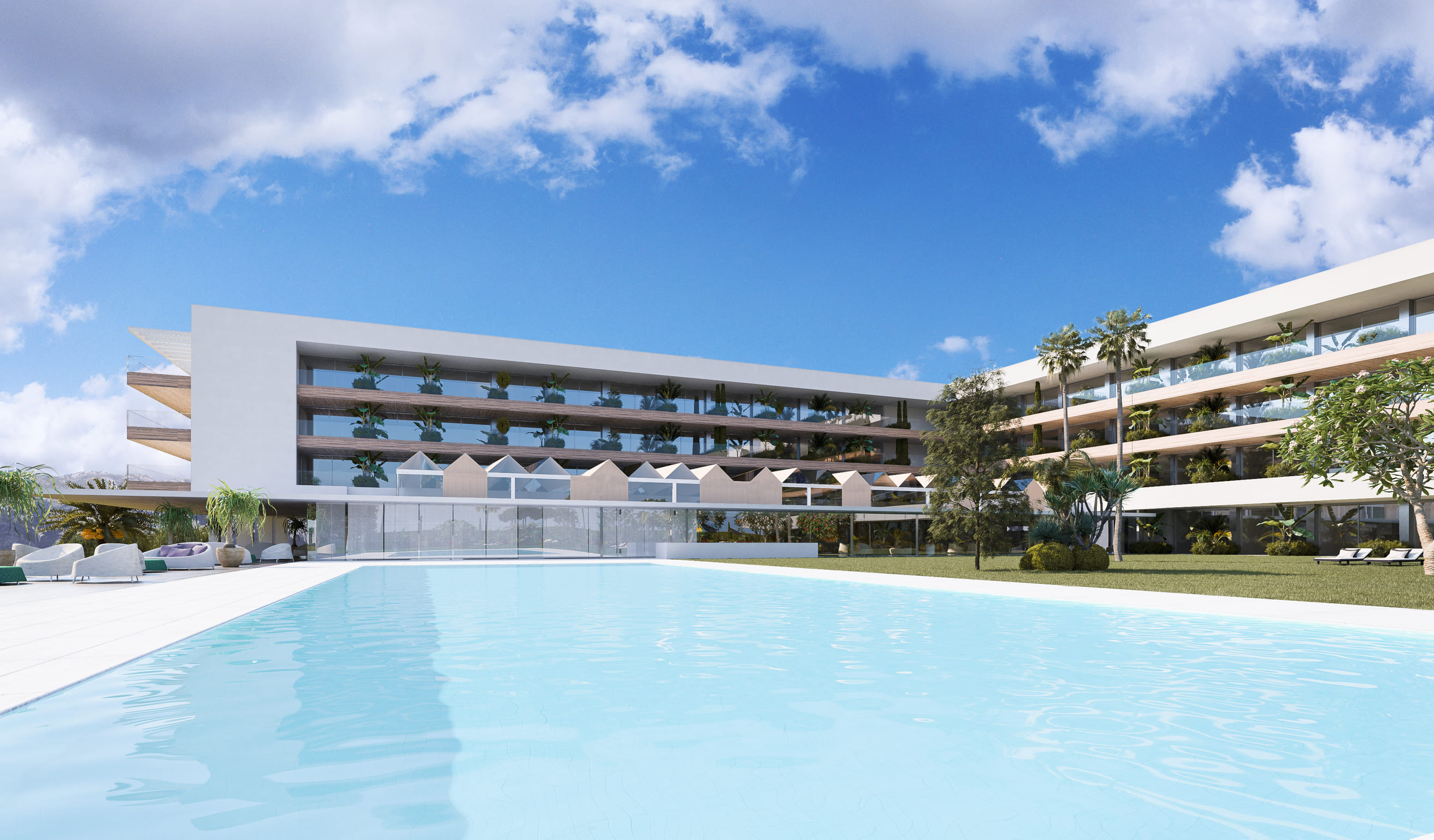 Piscina infinita al aire libre del Parador de Nerja reflejando el edificio y el cielo azul